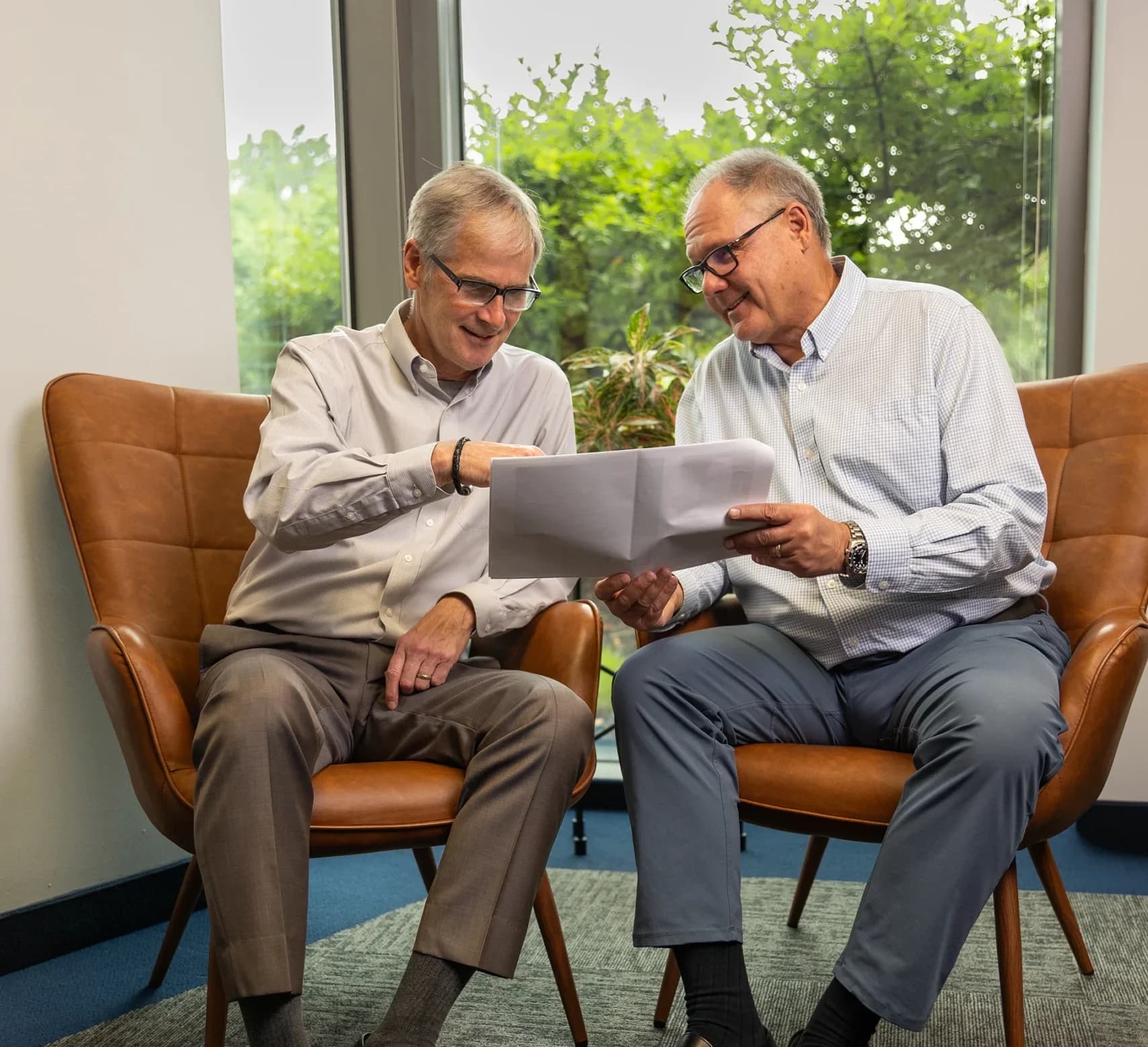 Two men discussing commercial properties